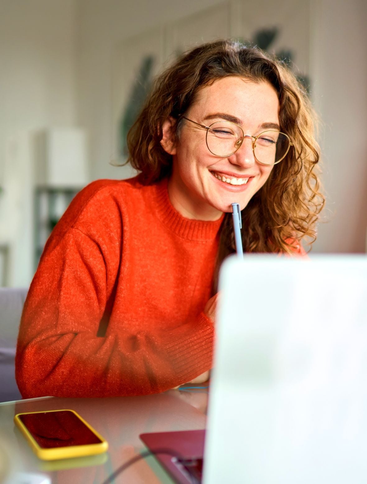 A clinician joining a live virtual session from home